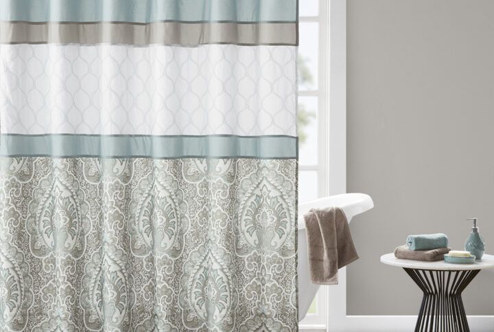 The 510 Design Shawnee Printed and Embroidered Shower Curtain adds a sophisticated flair to your bathroom decor. Featuring a printed and pieced design