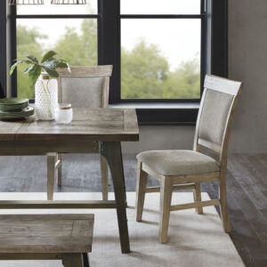 Complete your dining space with the rustic style of INK+IVY’s Oliver Dining Side Chair Set. This set of two dining side chairs feature cushioned backs and seats