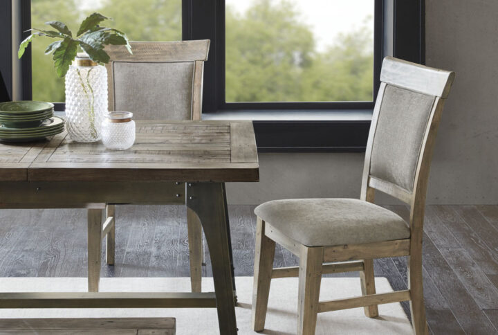 Complete your dining space with the rustic style of INK+IVY’s Oliver Dining Side Chair Set. This set of two dining side chairs feature cushioned backs and seats