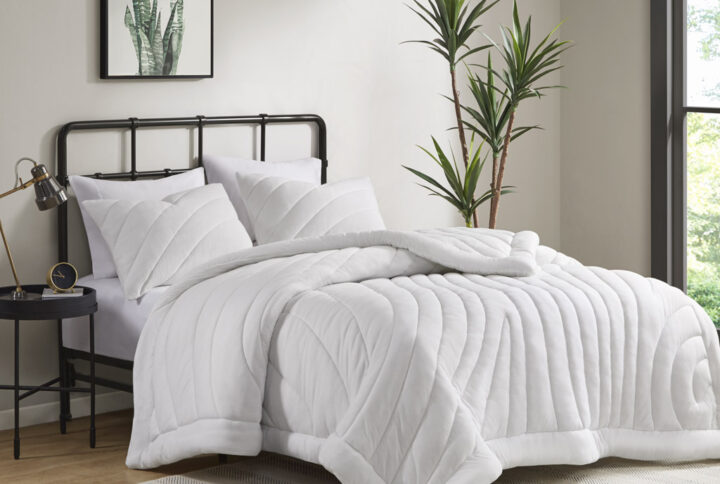 Snuggle up in a cloud of softness and warmth with this puffy jersey comforter set. A lofty 350gsm polyester fill makes the comforter extra cozy and comfortable