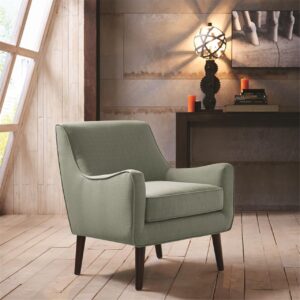 Update your living room with the Madison Park Oxford Mid-Century Accent Chair. Featuring mid-century inspired curves