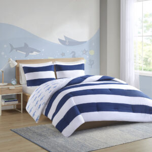 Add a bright and playful update to your kid's bedroom with the Urban Habitat Kids Sammie Cotton Cabana Stripe Reversible Comforter Set. This soft cotton comforter and 2 shams (1 in Twin) features a classic navy and white cabana stripe with a cool shark print on the reverse