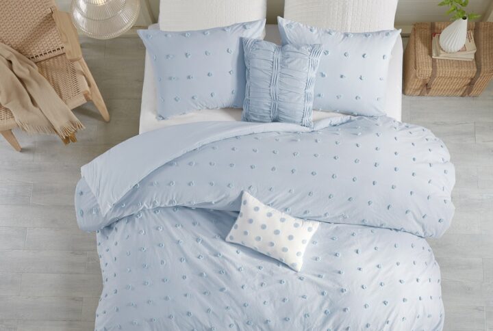 The Urban Habitat Brooklyn Cotton Jacquard Duvet Cover Set features small tufted chenille dots that create a fresh shabby chic look. This duvet cover set brings a soft and charming update to your bedroom