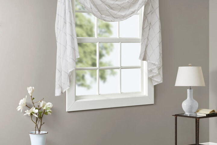 Madison Park’s Irina Diamond Sheer Window Scarf provides an alluring update to your home. An elegant diamond pattern is beautifully embroidered on a soft sheer fabric