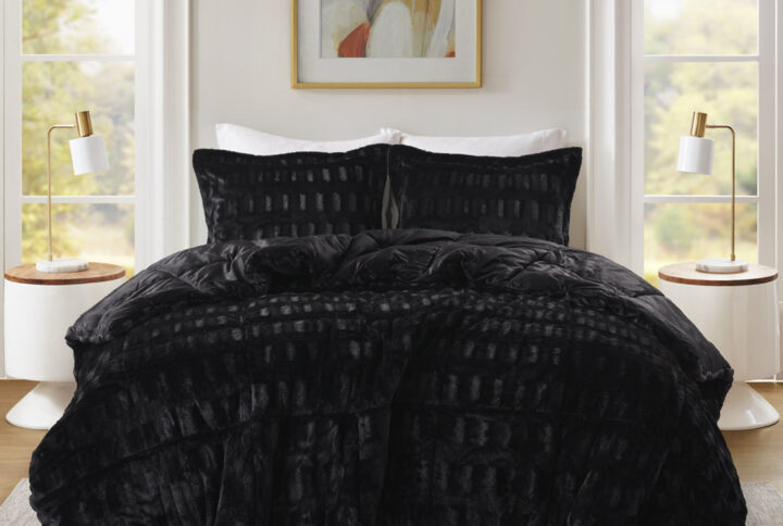 Sleep in the pure softness and comfort of the Madison Park Gia Solid Faux Fur Comforter Mini Set. The ultra-soft comforter flaunts a stylish brushed faux fur on the face that flips to a soft faux mink reverse