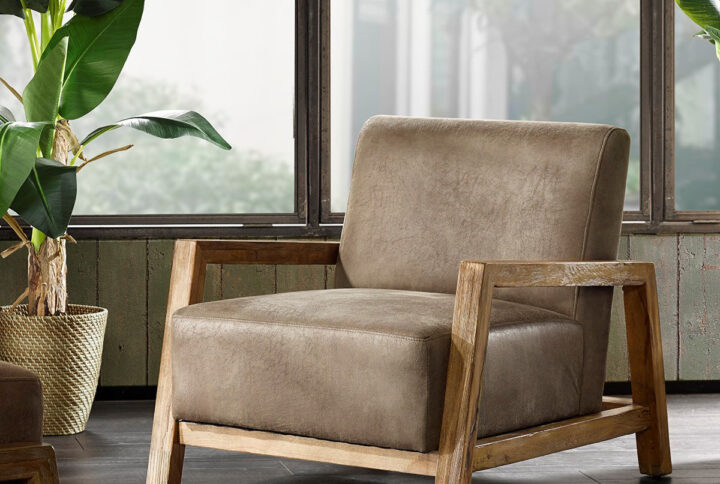 Add a sophisticated update to your living room with the INK+IVY Easton Low Profile Accent Chair. Upholstered in taupe polyurethane leather