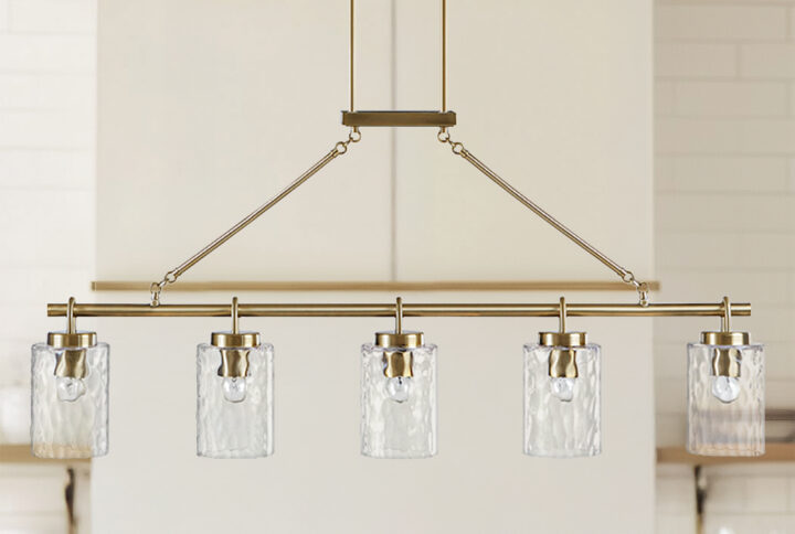 Elevate your space with the Ink+Ivy Curiana 5-light linear chandelier. This stylish fixture blends transitional design with a modern touch