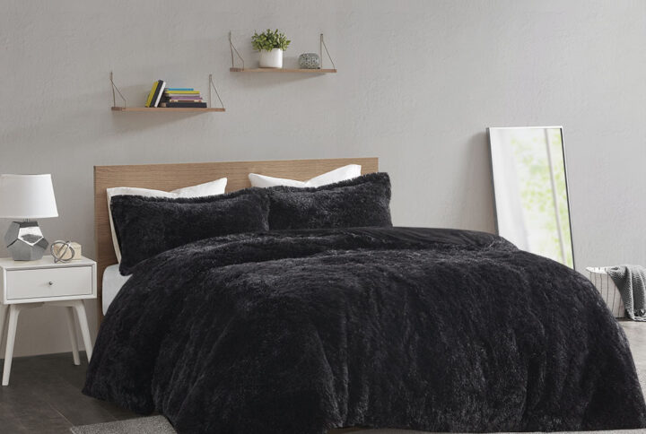 The Intelligent Design Malea Shaggy Fur Duvet Cover Set brings a soft contemporary update to your bedroom. The duvet cover and shams (1 in Twin/TwinXL) features stylish shaggy faux fur that creates a soft fluffy texture. The solid plush reverse adds a soft and warm touch. A zipper closure secures a padded insert within the duvet cover and inside corner ties prevent it from shifting (insert is NOT included).