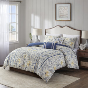 Elevate your bedroom with the refined allure of the Harbor House Livia 5 Piece Cotton Duvet Cover Set. The 100% cotton slub duvet cover showcases a botanical print