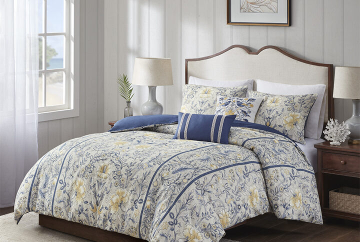 Elevate your bedroom with the refined allure of the Harbor House Livia 5 Piece Cotton Duvet Cover Set. The 100% cotton slub duvet cover showcases a botanical print