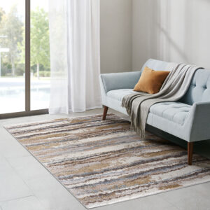 Add a modern textural touch to your living space with the Madison Park Riley Cozy Shag Watercolor Area Rug. This plush area rug flaunts cool shades of blue and tan in a watercolor design that creates a rich contrast to easily complement your decor. The super soft