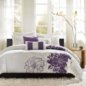 and a solid purple color. A button closure secures a comforter insert within the duvet cover and inside corner ties prevent it from shifting (insert is NOT included). This bedding set is also OEKO-TEX certified