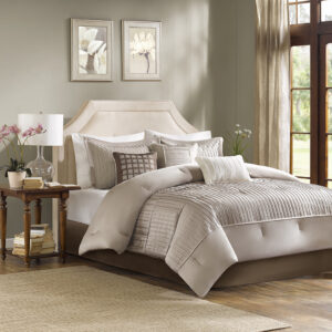 The Madison Park Trinity Collection provides a modern look through fabric manipulation. This beautiful taupe polyester charmeuse gives a slight sheen to this bed while the small pleating on the bottom half of the bed and corresponding shams provides great dimension for your room. Three decorative pillows use embroidery and pleating to bring this beautiful collection together. Items in the set may come in a rolled or compressed packaging