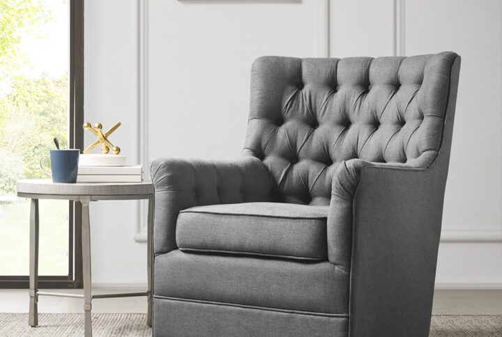 Relax in the comfort and style of the madison park mathis swivel glider chair. This swivel chair is upholstered in a soft fabric with a hand-tufted back to create a traditional look. The swivel glide base allows the chair to rotate 360 degrees