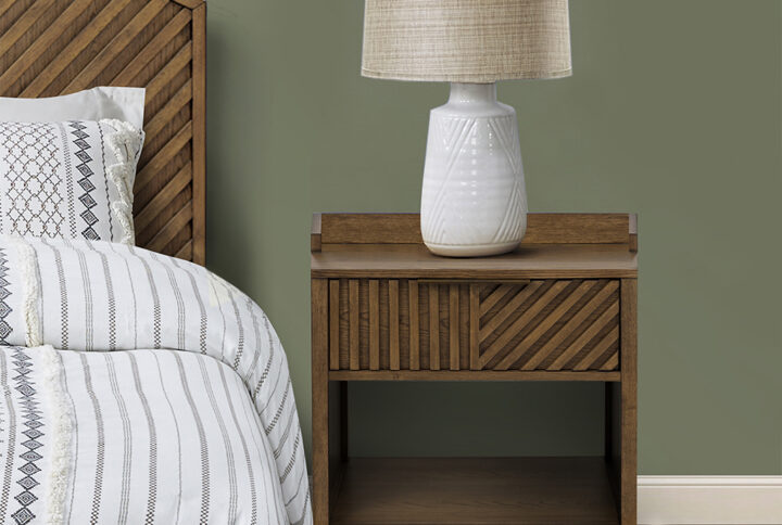 Complete your bedroom with the bold sophistication of INK+IVY’s Sunset Cliff modern nightstand. A grooved geometric wood slat design adorns the face of the single drawer to create texture and dimension