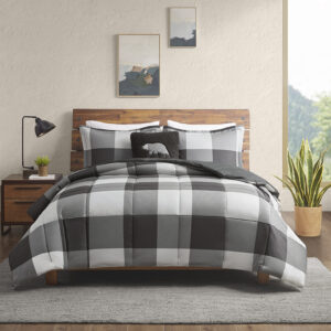 cabin touch to your bedroom with the Woolrich Hudson Valley Down Alternative Comforter Set. This comforter features a buffalo check pattern printed on a flannel-like softspun material with a microfiber reverse. The hypoallergenic down alternative fill provides extra warmth and comfort