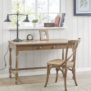 The Martha Stewart Tabitha Desk offers a simple and traditional update to your work space. This wooden desk features a reclaimed natural finish with turned wooden legs that add an elegant touch