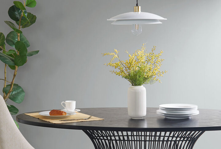 The Saben 2-Tier Layered Shade Pendant by INK+IVY provides a simple and classic addition to your dining room or kitchen decor. This single bulb hanging pendant features a double layered disc shade