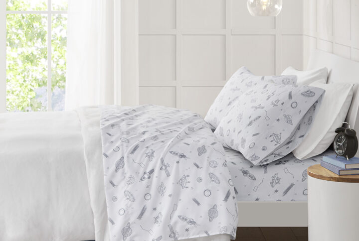 The Mi Zone Printed Sheet Set brings a delightful and charming update to your child's bedroom. This ultra-soft microfiber sheet set is naturally wrinkle-free and features an out-of-this-world design of space rockets