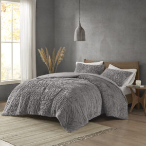 Add glamorous style and comfort to your bedroom with the Madison Park Blair Down Alt Ruched Faux Fur Comforter Set. This stylish comforter will liven up your bedroom with its unique texture and beauty. The face features a luxuriously soft faux fur with a stunning ruched design and a solid microfiber reverse. This bedding set includes 1 hypoallergenic polyester filled comforter and 2 shams to complete the look. This comforter set is also OEKO-TEX certified