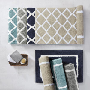 The Madison Park Bittman Reversible High Pile Tufted Bath Rug offers a modern update to your bathroom. Fully reversible