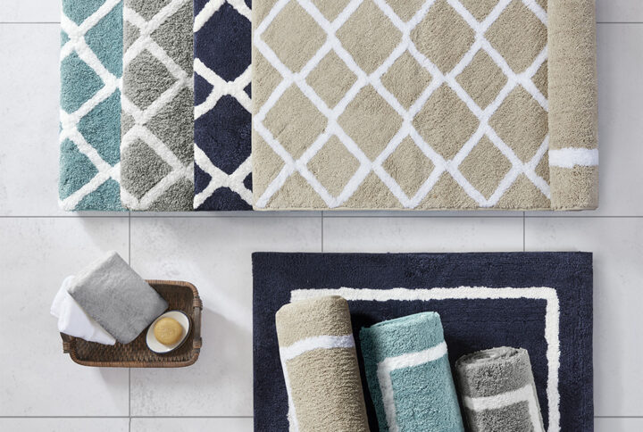 The Madison Park Bittman Reversible High Pile Tufted Bath Rug offers a modern update to your bathroom. Fully reversible