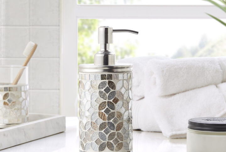 This timeless mosaic collection showcases hand-crafteded mosaic accessories to elevate your bathroom. The combination of champagne gold and silver stained glass in a floral motif reflects light beautifully and can be a luxurious centerpiece for bathroom decor.