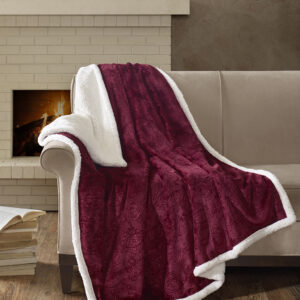 This super soft plush throw features a textured design that adds dimension to the throw. The reverse features a cozy berber to keep you warm. It's also oversized for added warmth and comfort.