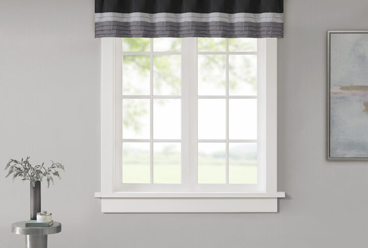 Madison Park Amherst Polyoni Pintuck Window Valance is a simple way to add style to your room. This window valance features a modern striped design in dark hues of black