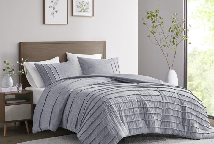 Beautyrest’s Maddox comforter set brings an elevated clean and casual vibe to your bedroom. With pleats on a striated blue fabric