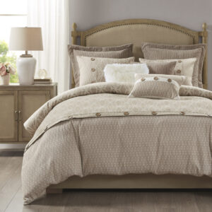 Elevate your bedroom with luxurious style of the Madison Park Signature Grace Geometric Jacquard Comforter Set. This oversized jacquard comforter features 2 geometric patterns