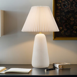 Elevate any space with the INK+IVY Veluna Ceramic Table Lamp. Its textured matte-white ceramic base and refined white tapered pleated shade infuse contemporary allure into your decor. With the added convenience of the included LED bulb