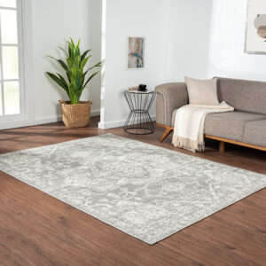 Soften your space with the Madison Park Asher Distressed Medallion Cream and Grey Woven Area Rug. Made in Turkey