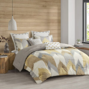 Elevate the beauty and style of your bedroom with the INK+IVY Alpine Comforter Mini Set. This cotton comforter set flaunts a sophisticated ikat chevron print on the face with a solid reverse to create a striking modern and elegant look. The 2 matching shams coordinate with the design of the cotton comforter to complete this dynamic bedding set. This comforter set is OEKO-TEX certified