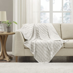 Wrap yourself in the lush comfort of the Madison Park Duke Long Fur Throw. The ultra-soft faux fur face provides comfort and coziness