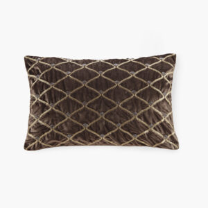 This sumptuous oblong pillow features foxtail stitched