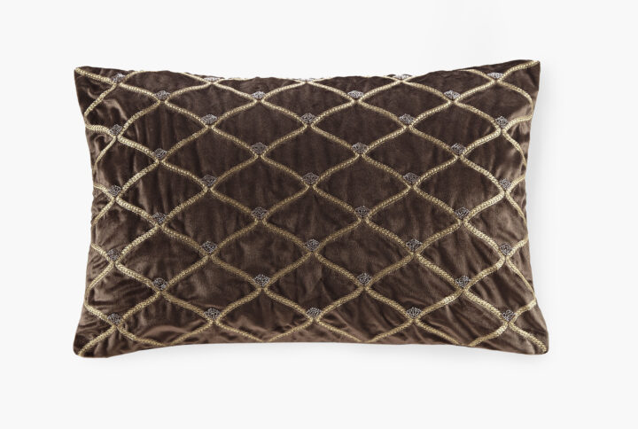 This sumptuous oblong pillow features foxtail stitched