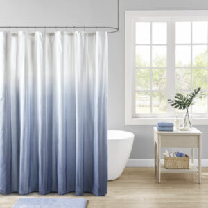 Add a refreshing touch to your bathroom decor with our Madison Park Ara Ombre Printed Seersucker Shower Curtain. This shower curtain features a blue ombre print on an embossed seersucker fabric