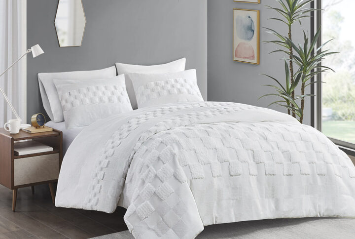 The Bennett duvet cover set features a unique checkered pattern with clipped chenille for a modern