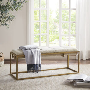 The Madison Park Greenwich Accent Bench offers a sleek and elegant update to your bedroom or living room decor. This accent bench is upholstered in a brown fabric and features a button-tufted seat that adds a sophisticated touch to the design. The antique bronze metal frame complements the upholstered seat to create a stunning mid-century look. Leg assembly is required and a tool is included.