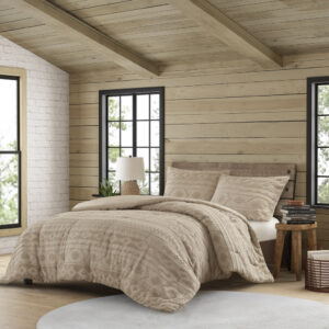 The Breckenridge bedding collection by Woolrich features a chenille tufted jacquard design in a southwestern pattern for an elevated look to your cozy transitional home.  The neutral on neutral tones softens the overall look and easily makes this a year round bed. The coordinating shams (1 in Twin/Twin XL) come with a button closure for a nice subtle touch. The polyester comforter filling is also hypoallergenic