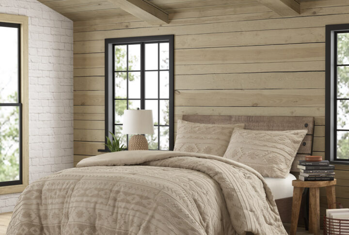 The Breckenridge bedding collection by Woolrich features a chenille tufted jacquard design in a southwestern pattern for an elevated look to your cozy transitional home.  The neutral on neutral tones softens the overall look and easily makes this a year round bed. The coordinating shams (1 in Twin/Twin XL) come with a button closure for a nice subtle touch. The polyester comforter filling is also hypoallergenic