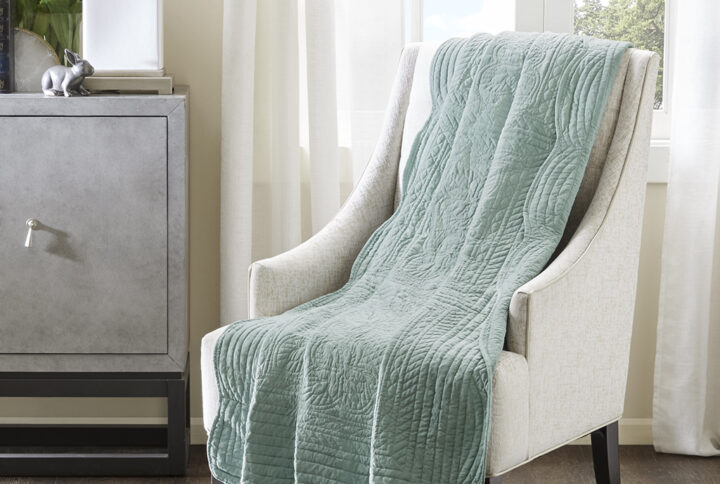 Tuscany is the perfect quilted throw for a new solid look. The decorative stitch pattern pairs easily with your existing decor and will sure to add a new decorative element with the beautiful scalloped edges. This quilted throw is filled with cotton filling and features a polyester microfiber fabrication on the face and the reverse. Its prewashed finish gives a worn in appearance to this decorative throw.