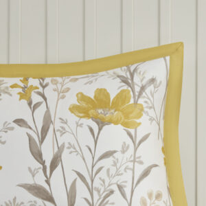 for a warm transitional look. The matching shams showcase a 2-inch yellow flange and a botanic print that coordinates with the top of the oversized comforter. Two decorative pillows