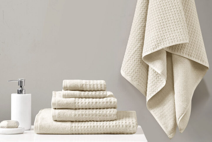 Our Madison Park Spa Waffle Cotton Towel 6 Piece Set provides the perfect textured update to your bathroom decor. This 100% cotton towel set features an all-over waffle combed jacquard design for a rich texture