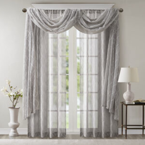 adding grace and charm to your décor. The neutral colors and light fabric helps create a delicate look to soften any room. Perfect on it's own as a beautiful drape to frame any window