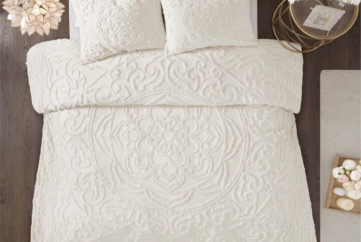 The Madison Park Laetitia Tufted Cotton Chenille Medallion Duvet Cover Set provides an alluring shabby chic update to your bedroom. This globally inspired duvet cover features a 100% cotton face and reverse with a tufted chenille medallion centered on top of the bed. The 2 matching shams (1 in Twin/Twin XL) coordinate with the cotton duvet cover to complete the boho look. Perfect for all season use