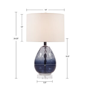 this glass table lamp flaunts a blue hue that adds a soft touch of color to your room. The cream drum-shaped lamp shade tastefully accents the base