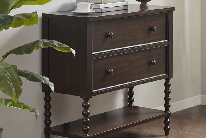 Elevate your living room with the sophisticated style of the Madison Park Signature Beckett Accent Chest. This 2-drawer accent chest features a solid wood frame and elegant turned legs