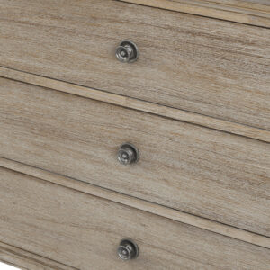 French inspired 6 drawer dresser with a wire brushed natural finish with grey highlights. Leg assembly required.